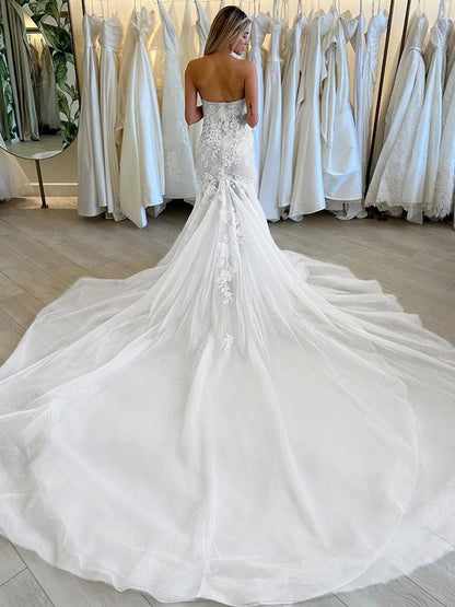 Trumpet/Mermaid Tulle Applique Strapless Sleeveless Cathedral Train Wedding Dresses